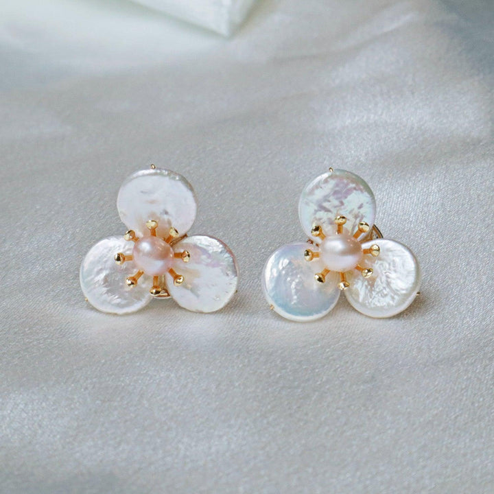 Pearlpals freshwater  baroque pearls stud earrings delicately crafted with three petal-shaped pearls surrounding a central pearl bud