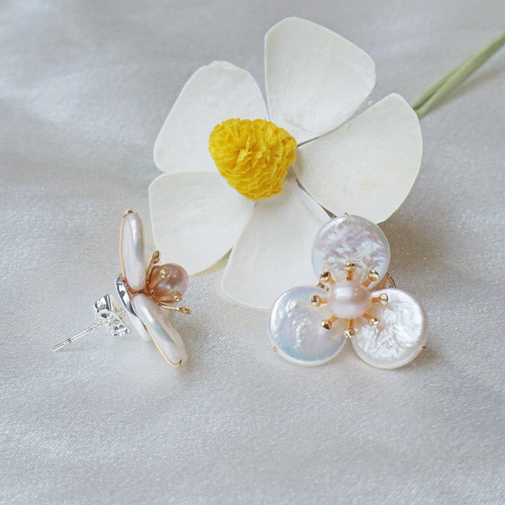 Pearlpals freshwater baroque pearls stud earrings delicately crafted with three petal-shaped pearls surrounding a central pearl bud