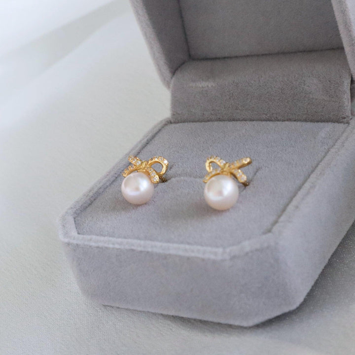 Pearlpals 6mm freshwater pearl stud earrings with butterfly knot and diamond in gold vermeil