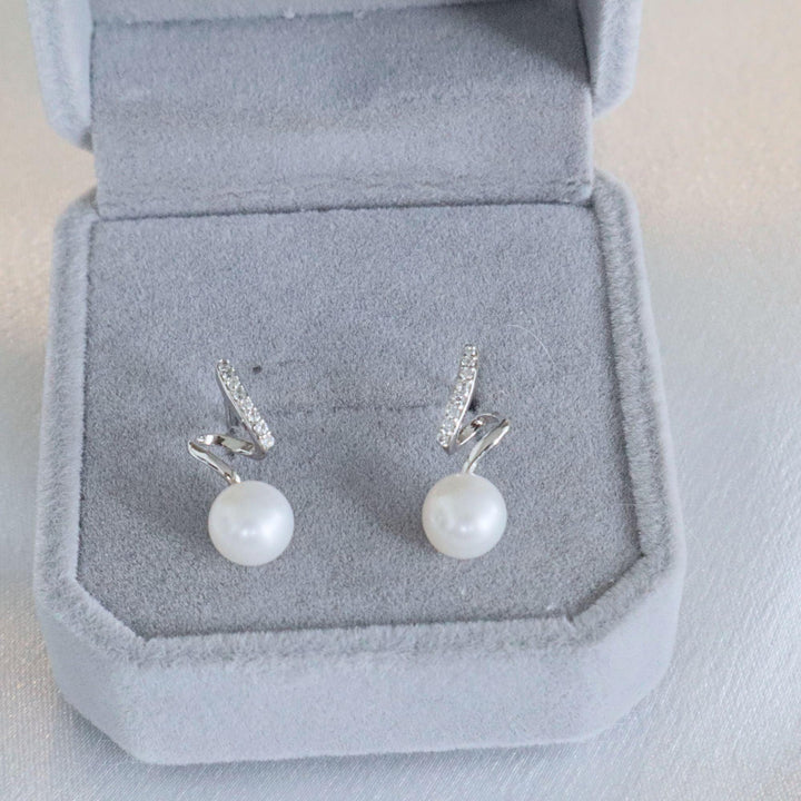 6.5mm button freshwater pearl stud earrings in sterling silver