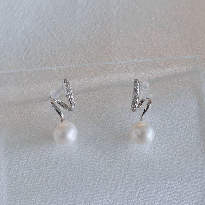 6.5mm button freshwater pearl stud earrings in sterling silver