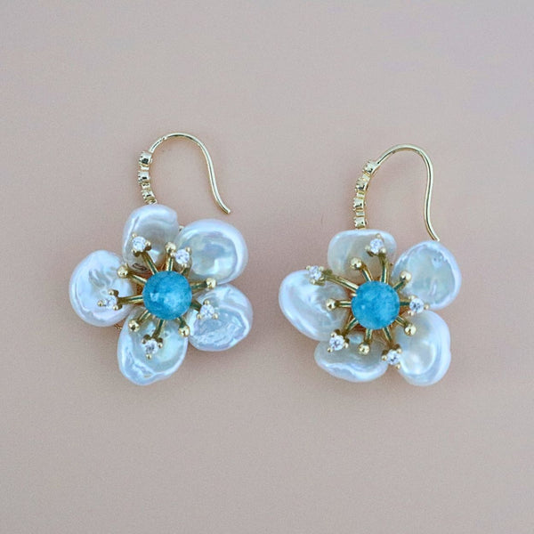 Pearlpals Baroque pearls earrings in petal flower shape with blue gem
