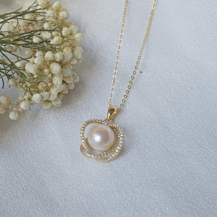 Pearlpals 8mm gold pearl pendant necklace in the middle of diamond galaxy