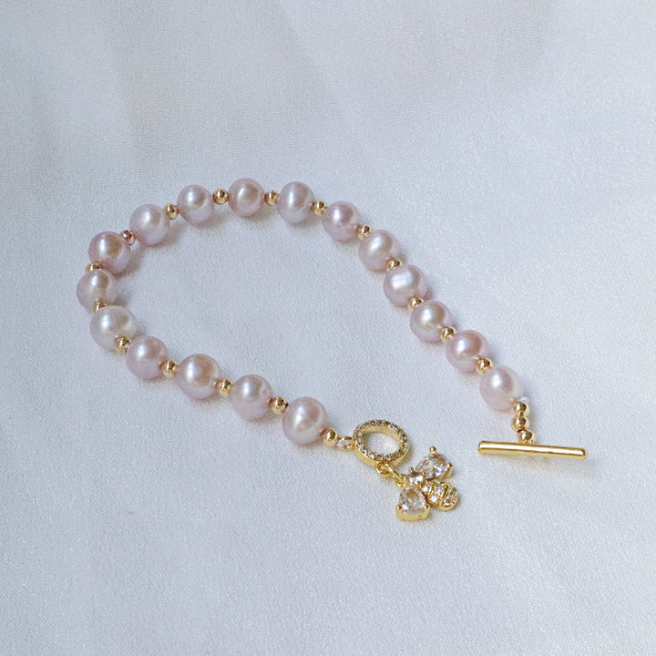 Pearlpals Bee shaped pendant and Purple Freshwater Pearl Bracelet in Gold plated material