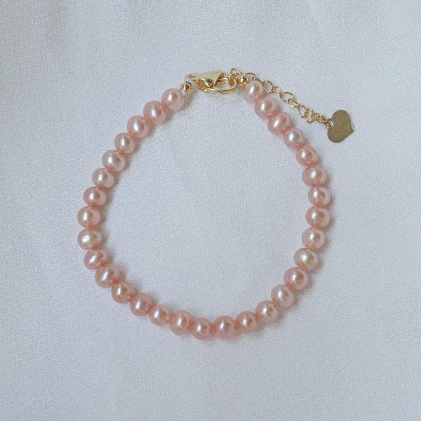 Pearlpals The pink  freshwater pearl bracelet crafted from gold-plated materials. 